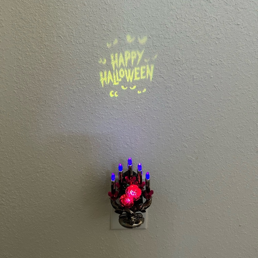 Wallflower Halloween Plug in with Roses and Flames lights up Happy Halloween